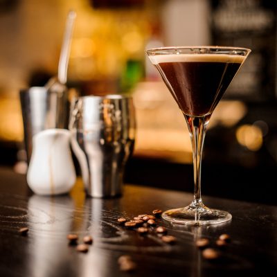 garnish martini espresso cocktail drink foam coffee bean on top bar counter